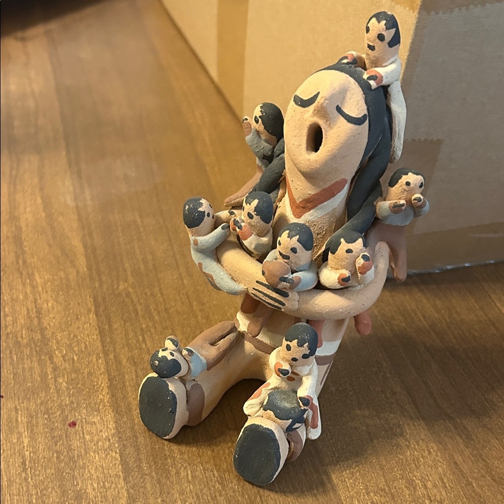 Hand-Painted native-American storytelling Figurine - Nine children all around.